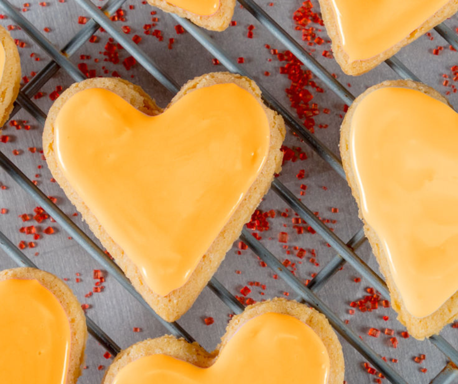 orange heart shaped cooking sitting on a tray