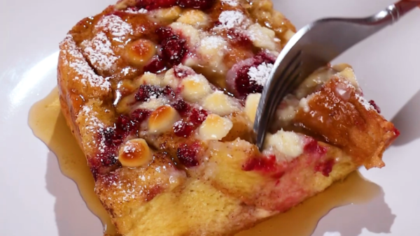 a fork going into a piece of French toast casserole